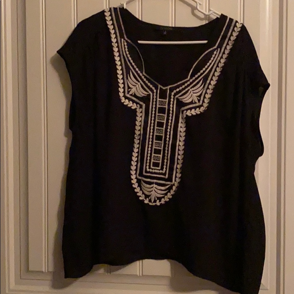 Embroidered pattern on front.